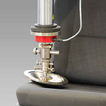 Automotive seat testing Seat testing close-up of indenter: Special ZwickRoell testing system for universal automotive seat testing applicable to both on the complete seat at various positions and according to common standardized foam tests