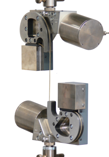 Specimen grips with 270° deflection for steel strip cord